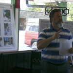 Tacoma City Councilmember Marty Campbell discusses the Lincoln Neighborhood Revitalization Project during an open house Thursday in Tacoma. (PHOTO BY TODD MATTHEWS)