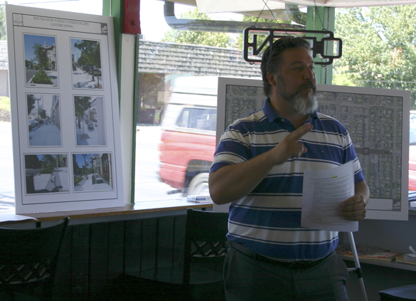 Tacoma City Councilmember Marty Campbell discusses the Lincoln Neighborhood Revitalization Project during an open house Thursday in Tacoma. (PHOTO BY TODD MATTHEWS)