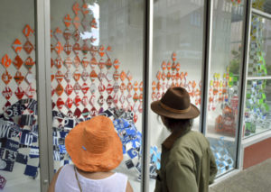 Spaceworks Tacoma's Artscapes program turns downtown storefront windows and outdoor wall spaces into canvases for local artists, including the Woolworth Windows near Broadway and South 11th Street. (PHOTO COURTESY SPACEWORKS TACOMA)