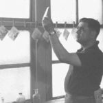 Elmer Ogawa developing photographs during the 1950s. (ELMER OGAWA PHOTOGRAPH / COURTESY UNIVERSITY OF WASHINGTON LIBRARIES SPECIAL COLLECTIONS)