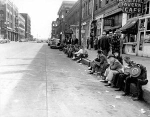 A scene outside Seattle's Occidental Tavern Cafe circa 1952. (ELMER OGAWA PHOTOGRAPH / COURTESY UNIVERSITY OF WASHINGTON LIBRARIES SPECIAL COLLECTIONS)