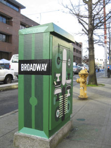 Earlier this year, the City of Tacoma invited local artists to participate in a program to create artwork for traffic signal boxes located throughout the city. Similar programs exist in Seattle (pictured) and Olympia. (PHOTO BY MAGGIE LEE)