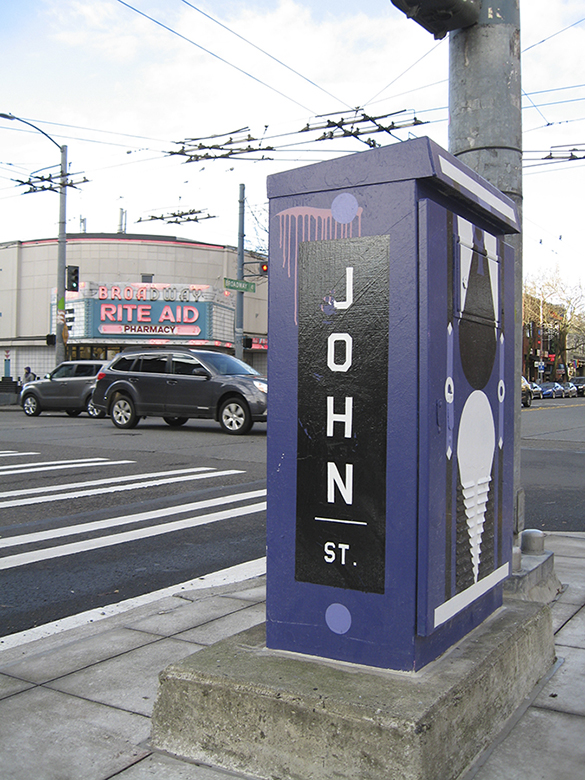 Earlier this year, the City of Tacoma invited local artists to participate in a program to create artwork for traffic signal boxes located throughout the city. Similar programs exist in Seattle (pictured) and Olympia. (PHOTO BY MAGGIE LEE)