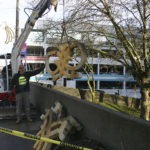 Contractors on Wednesday removed a downtown Tacoma art installation created 40 years ago by Pacific Northwest artist Harold Balazs. A City of Tacoma staff report recently noted the artwork was unstable and posed a safety hazard. (PHOTO BY TODD MATTHEWS)