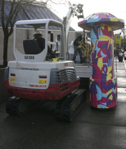 Contractors on Wednesday removed a downtown Tacoma art installation created 40 years ago by Pacific Northwest artist Harold Balazs. A City of Tacoma staff report recently noted the artwork was unstable and posed a safety hazard. (PHOTO BY TODD MATTHEWS)