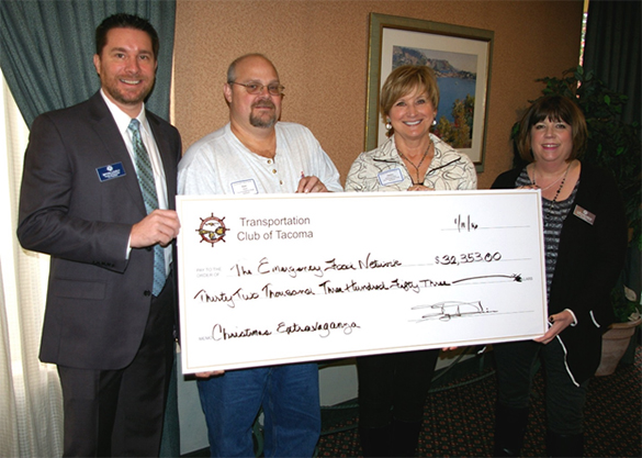 The Transportation Club of Tacoma recently donated more than $32,000 to the Emergency Food Network of Pierce County. Transportation Club of Tacoma President Bryan Lovely (far left) and and Transportation Club of Tacoma Director Lori Kincannon (far right) presented a check to Emergency Food Network Operations Manager Ken Hess and Emergency Food Network Executive Director Helen McGovern-Pilant earlier this month. (PHOTO COURTESY EMERGENCY FOOD NETWORK)