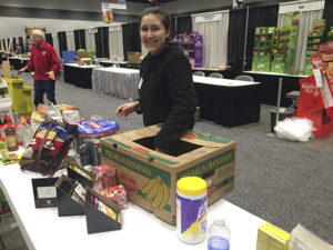 Approximately 43,000 pounds of food and household items were recently donated to the Emergency Food Network of Pierce County following a two-day convention and trade show hosted by Unified Grocers in downtown Tacoma. This year, vendors were given the opportunity to donate products left over at the end of the event to help people in need. In the end, Emergency Food Network, with the help of twenty volunteers, filled an entire semi-trailer and box truck with food and household items. (PHOTO COURTESY EMERGENCY FOOD NETWORK OF PIERCE COUNTY)