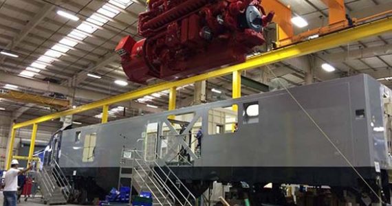The first new Cummings engine is lowered into a Siemens Charger locomotive body. (PHOTO COURTESY WSDOT)