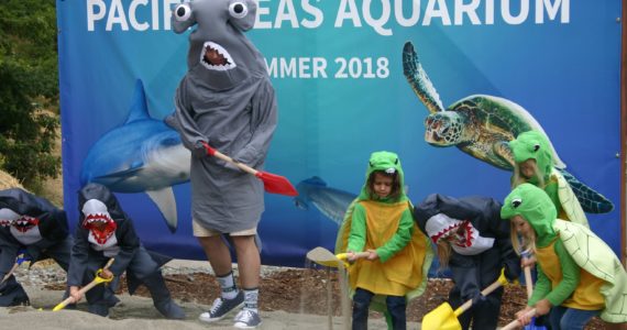 Children are enlisted to break ground for construction of Tacoma's new Pacific Seas Aquarium, Monday, July 11. Credit: David Guest / TDI