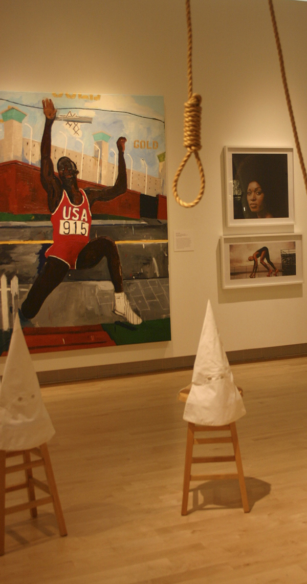 Gary Sminnon's installation, "Duck, Duck, Noose," foreground, with Henry Taylor's "The Long Jump by Carl Lewis." Credit: David Guest / TDI