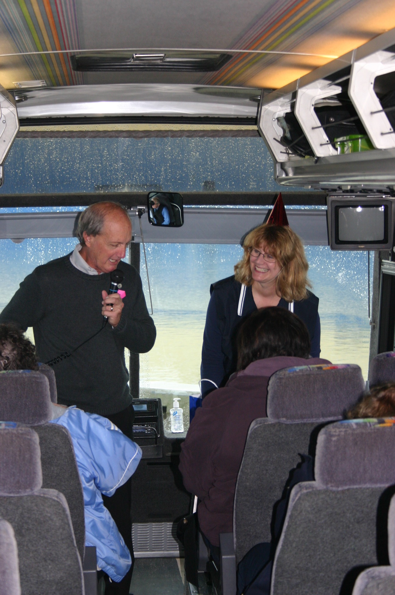Rod Koon, left, and Leslie Barstow take visitors on a bus tour of Port of Tacoma facilities. Credit: David Guest / TDI