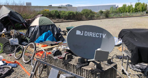 The emergence of homeless camps, like this one near the Port of Tacoma, parallels the rise of McMansions and inflated real estate prices. Photo: Morf Morford