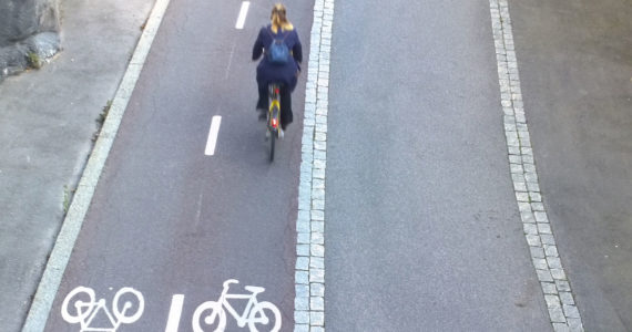 This bike "highway" in Copenhagen has directional lanes for bikes and a separate lane for non-bicycle pedestrian use - walkers, skaters, baby-strollers or wheelchairs.       Photo: Morf Morford