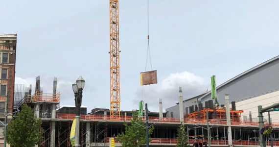 Once a rare sight, building cranes have become common across Tacoma's landscape.          Photo: Morf Morford