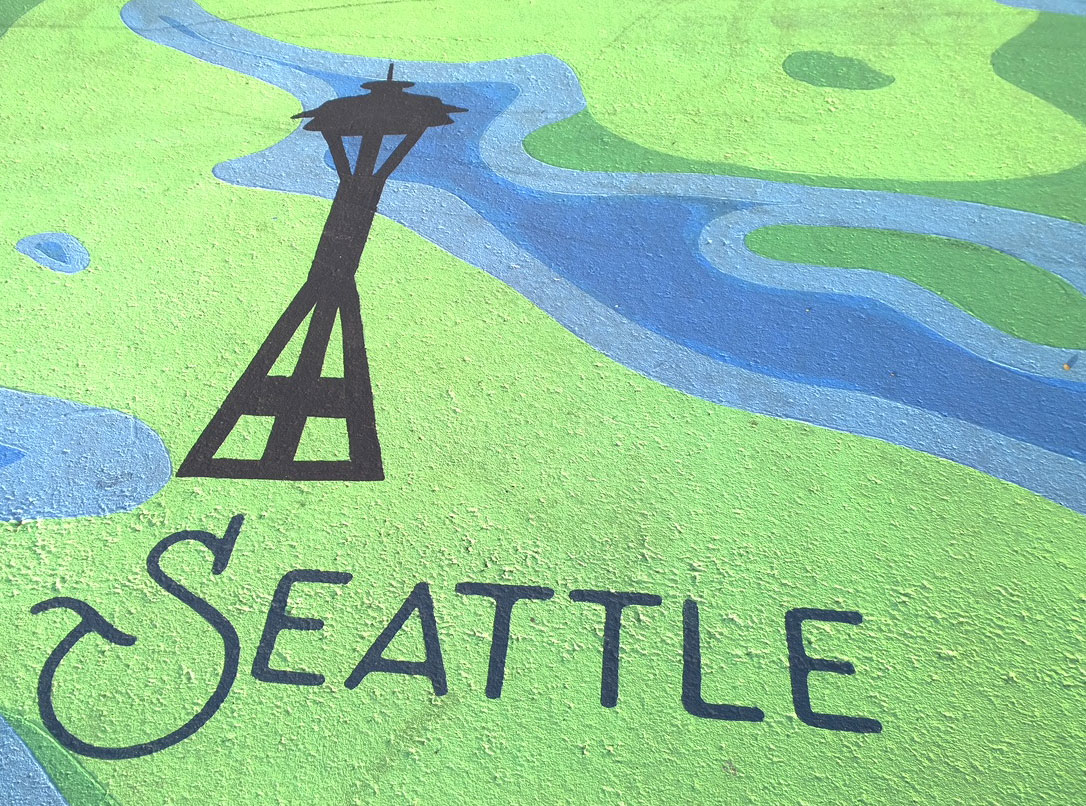 Artistic tributes to Seattle can be found all over Tacoma. This one is from a mural at Point Ruston. You will find few Tacoma references in Seattle. Photo: Morf Morford