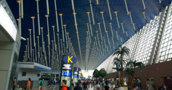 This is the check-in lobby of one of the airports of Shanghai from about five years ago. It resembles a space station more than a standard airport.  Photo: Morf Morford