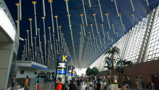 This is the check-in lobby of one of the airports of Shanghai from about five years ago. It resembles a space station more than a standard airport.  Photo: Morf Morford