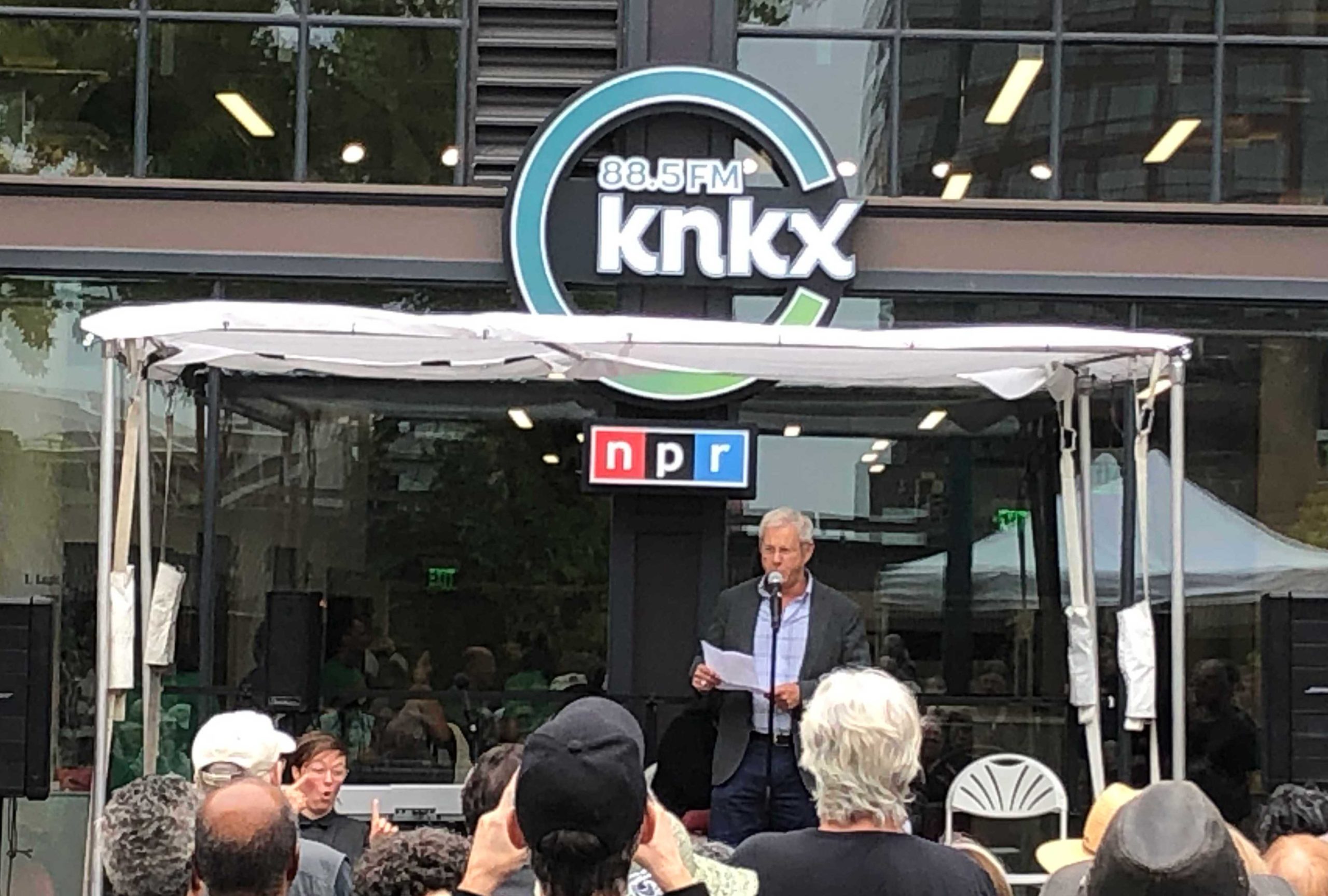 General Manager Joey Cohn addresses the crowd at the grand opening of the new studio in downtown Tacoma. Photo: Morf Morford