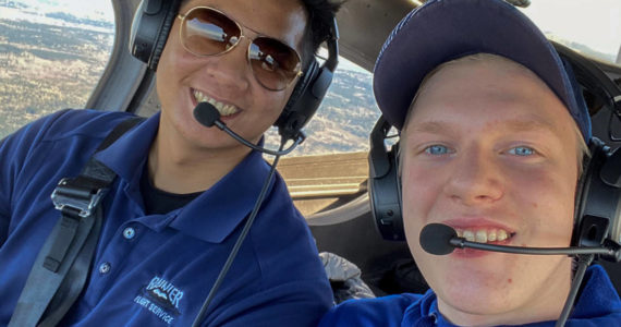 Image: Rainier Flight Service Flight Instructor and Museum of Flight Aeronautical Science Pathway graduate Christian Canlas (left) with currently-enrolled ASP student Stephen Green on one of Green’s first instructional flights. The photo was taken just before wearing face masks became the norm. Photo Stephen Green; Courtesy Museum of Flight