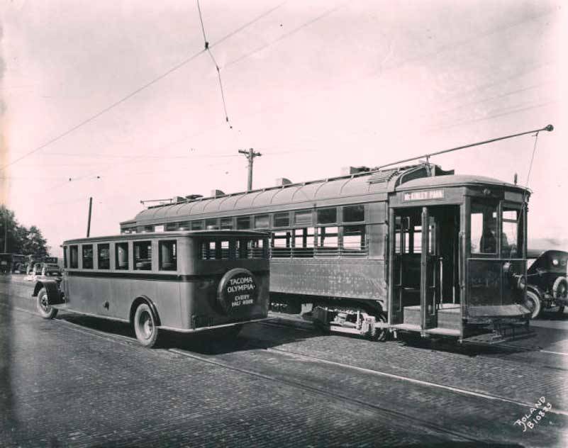 This photo from the 1920s shows a rail car going to McKinley Park and a bus with a run (every half hour) from Tacoma to Olympia. Photo courtesy of Northwest Room, Tacoma Public Library