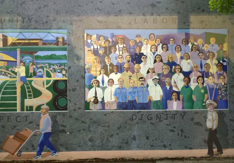 This street-side mural in Eugene, Oregon is a tribute to workers. (Photo by Morf Morford)