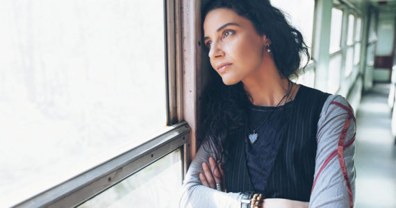 Depressed woman in a train