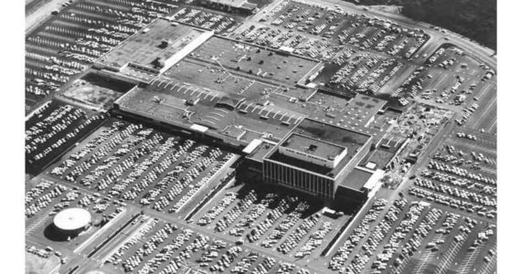 The Tacoma Mall opened in October 1965. This photo was taken in 1966 and shows the Bon Marche (center, right) and the more than 7,000 parking places. Image courtesy of Tacoma Public Library - image # C148862-4