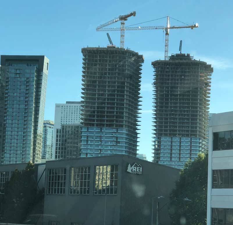 These buildings in downtown Seattle may not have been intended for housing, but sometime in their life-span, they almost certainly will. (Photo by Morf Morford)