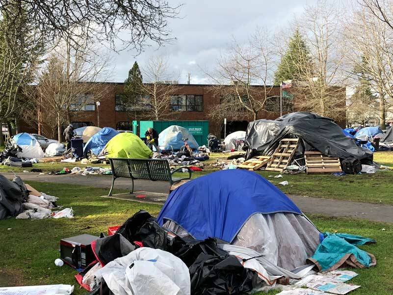 How many of the residents of this homeless camp will be moving into the new units on Proctor or at Point Ruston? (Photo by Morf Morford)