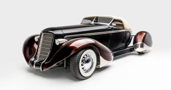 “SLOW BURN”
SPECS: 1936 AUBURN 852 BOATTAIL SPEEDSTER (MODERN REPLICA) BUILDER: RICK DORE KUSTOMS INTERIOR: EGYPTIAN LEATHER BY BOB DEVINE/RICK DORE ENGINE: 350-CUBIC INCH CHEVROLET V-8
<em>Image courtesy LeMay-America’s Car Museum, Petersen Automotive Museum and the Hetfield Family</em>
Bio: “Slow Burn” was crafted from an official Glen Pray recreation of an Auburn Boattail. The fiberglass body made it difficult to alter extensively, so Hetfield and Dore instead added details, like a sloped, Carson-style convertible top, to emphasize the car’s curving lines. The root beer paint color of the fenders, in contrast with the darker body color, highlights their sinuous shape. Accents like the geometric grille, taillight trim, and personally designed wheels exemplify Hetfield’s personal style.