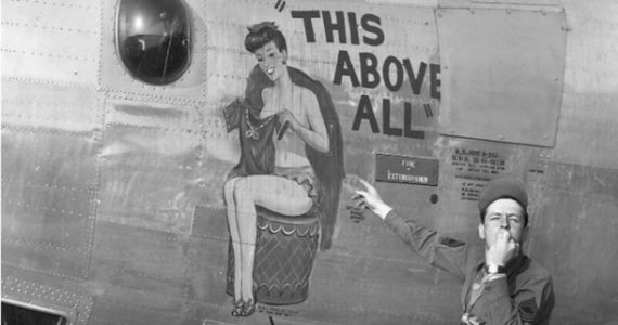 Image: Soldier points at the nose art on a B-24 bomber during World War II. Courtesy The Museum of Flight.