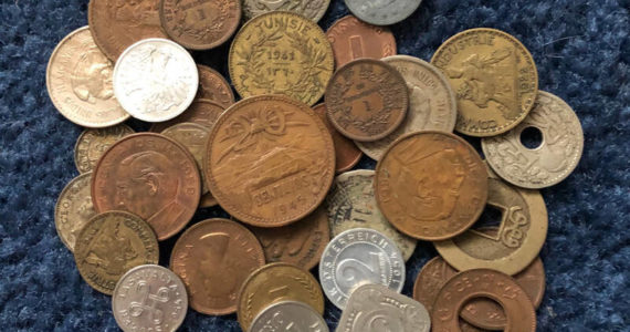 I’ve always been intrigued by coins. It never really mattered to me if they were of value to a collector. Or my cat. (Photo by Morf Morford)