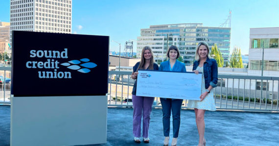 Sound Credit Union’s annual charity auction benefits Business Impact NW this year. Individuals in the photo are, from left to right: Halle Fort, Community Relations Ambassador at Sound Credit Union Greta Stough, Chief Strategic Officer at Business Impact NW Jennifer Reed, VP/Marketing at Sound Credit Union Image courtesy Sound Credit Union