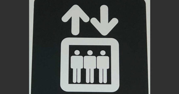 I don’t know what this sign was intended to mean, but there must be a term for a group of men who can’t decide which way to go - and refuse to ask for directions. (Photo by Morf Morford)