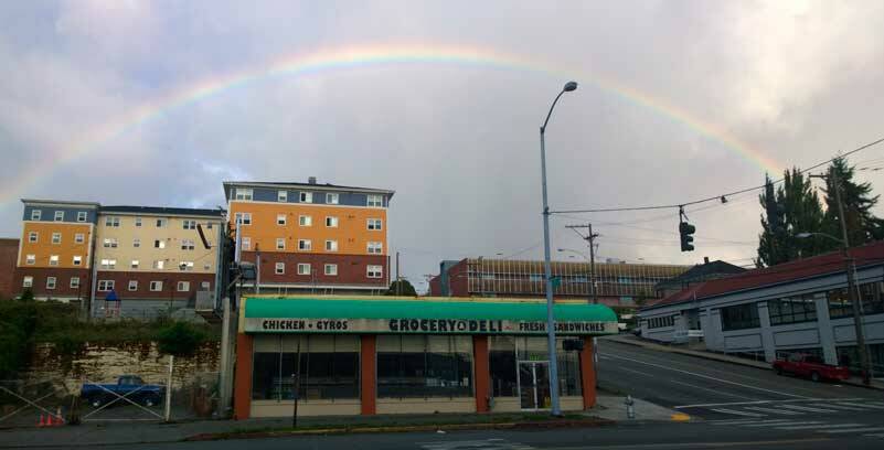 As the song from The Wizard of Oz puts it, there’s refuge “somewhere over the rainbow”. We in Tacoma, for better or worse, live our lives under the rainbow. (Photo by Morf Morford)