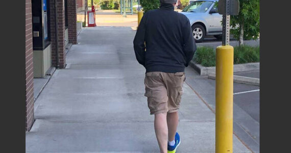 This gentleman is dressed for all the weather of May. With a winter cap, jacket and shorts, he’s ready for anything. (Photo by Morf Morford)