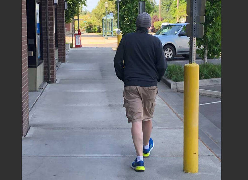 This gentleman is dressed for all the weather of May. With a winter cap, jacket and shorts, he’s ready for anything. (Photo by Morf Morford)