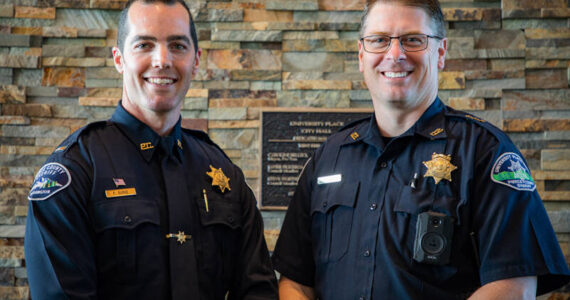 Patrick Burke (left) will be the new chief of police for the City of University Place. Chief Greg Premo (right) is retiring. (Image courtesy City of University Place)