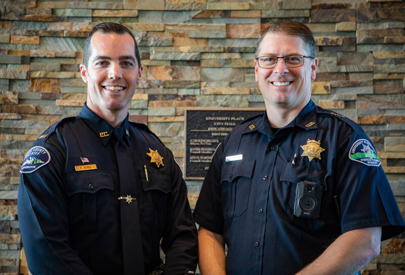 Patrick Burke (left) will be the new chief of police for the City of University Place. Chief Greg Premo (right) is retiring. (Image courtesy City of University Place)