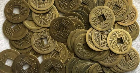 Piles of Chinese coins may - or may not- buy as much as they used to. (Photo by Morf Morford)