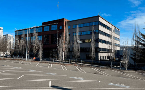 Photo of the 1501 Building from the surface parking lot. (Image courtesy Pierce County)