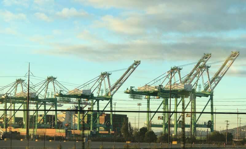 These cranes at the Port of Tacoma do a lot more than move cargo - they connect us with distant cultures and markets most us will never see. (Photo by Morf Morford)