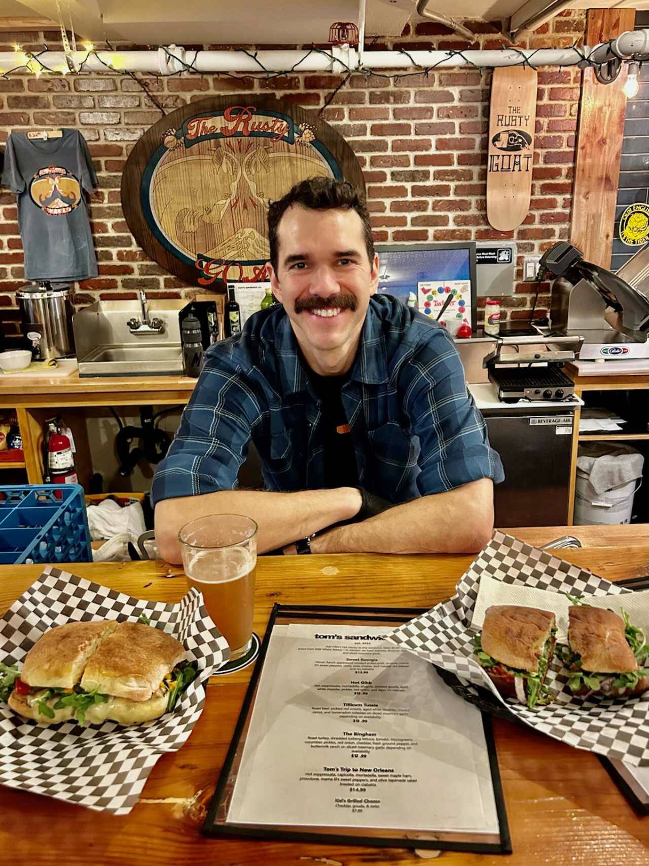 Tom Gibbon, owner of tom's sandwich co. Photo by Kelly Reehorn