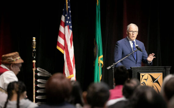 Gov. Jay Inslee addresses a packed room before signing a number of bills into law on Tuesday, March 19, 2024, at Tulalip Casino’s Orca Ballroom in Tulalip, Washington. (Ryan Berry / The Herald)