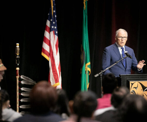 Gov. Jay Inslee addresses a packed room before signing a number of bills into law on Tuesday, March 19, 2024, at Tulalip Casino’s Orca Ballroom in Tulalip, Washington. (Ryan Berry / The Herald)