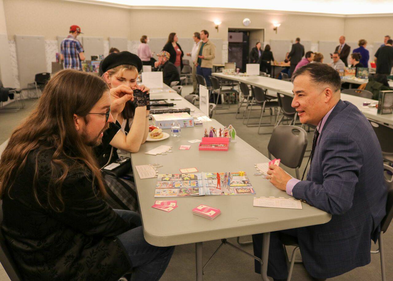 Washington Secretary of State Steve Hobbs, right, seen here at a game night event in February 2024, at the state Capitol in Olympia, will travel to Japan on a trip to promote economic ties between the country and Washington state, including in the tabletop gaming sector. (Secretary of State’s Office)