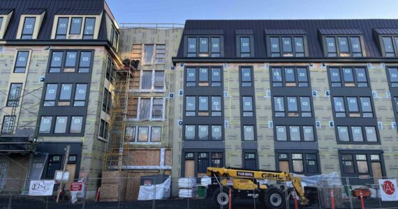 An apartment building construction site in Olympia, Washington in January 2025. (Photo by Bill Lucia/Washington State Standard)
