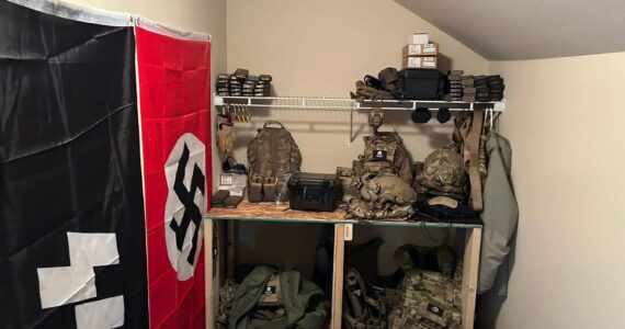 Investigators say they found military equipment and Nazi flags in the home of two Lacey men arrested this week. (Photo courtesy of the Thurston County Sheriff’s Office)
