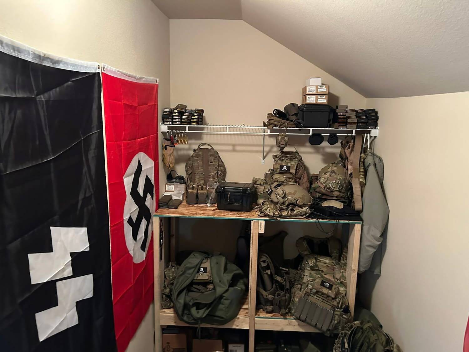 Investigators say they found military equipment and Nazi flags in the home of two Lacey men arrested this week. (Photo courtesy of the Thurston County Sheriff’s Office)