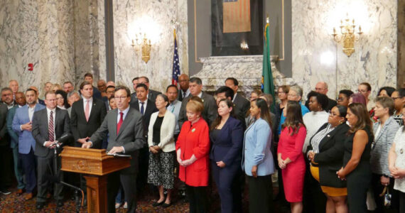 Photo by Bill Lucia/Washington State Standard
Gov. Bob Ferguson makes remarks during a press conference at the state Capitol in Olympia, on Aug. 19, responding to a letter he received the previous week from U.S. Attorney General Pam Bondi, threatening to withhold federal funding if the state does not change its approach cooperating on federal immigration enforcement.